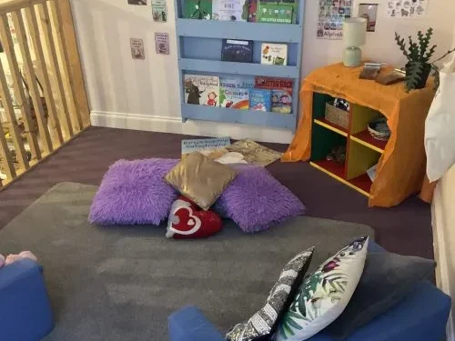 Cosy reading and relaxation area at Hunny Pot Nursery