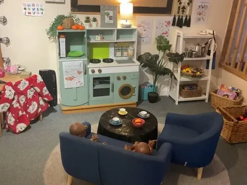 Indoor role-play and learning space at Hunny Pot Nursery